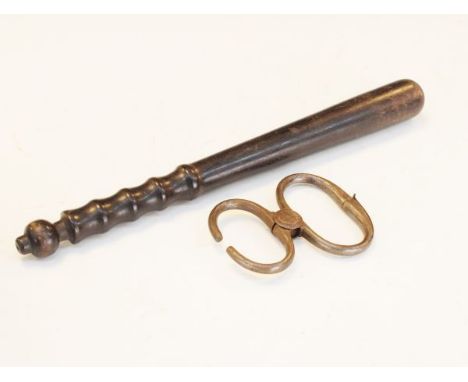 Vintage hardwood police truncheon together with a steel bulls nose ring   Condition: 