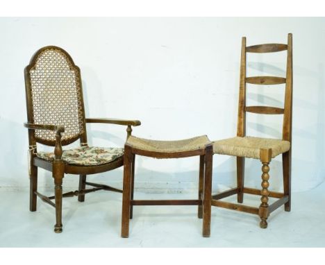 1930's period fireside chair having a split cane back, a beech ladder back high back chair on bobbin turned supports and a ru