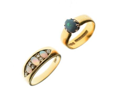 22ct gold ring set opal and an 18ct gold opal and diamond set dress ring   Condition: 