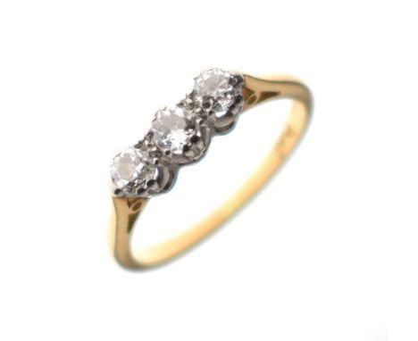 Three stone diamond ring, the shank stamped 18ct and plat, size J   Condition: 