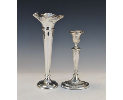 George V silver Neo-classical design candlestick, Chester 1912 and a George V silver spill vase, Sheffield 1921   Condition: 