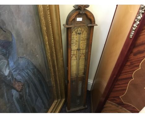 A Fitzroy barometer with a height of 113cm.