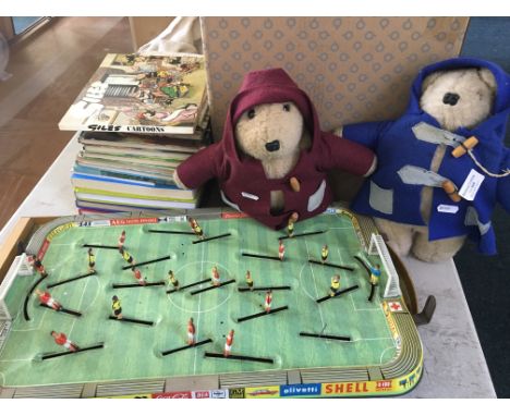 Two Paddington bears, a tin football game, a wooden bagatelle game, two Giles books etc.