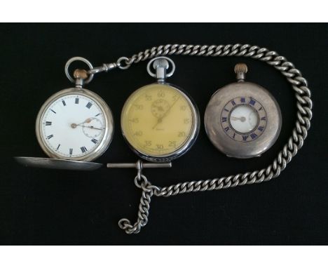 A silver Omega crown wind full hunter pocket watch, the white enamel dial having hourly Roman numeral markers with minute tra