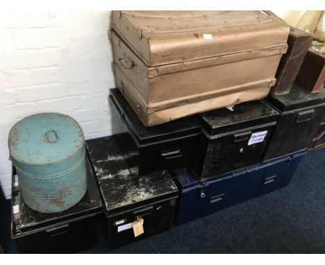 Ten various trunk and travel cases containing a large quantity of books and hats.
