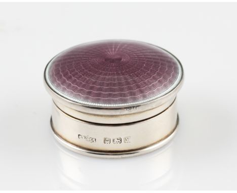 A 1920s silver and enamel trinket box, the circular design having purple guilloche enamel lid, hallmarked Birmingham 1923, he
