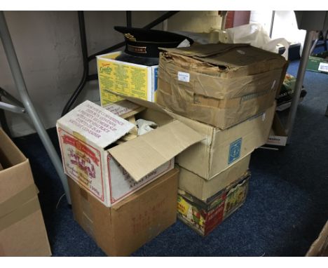 Several boxes of various train related items to include model trains, a Foreman cap etc.