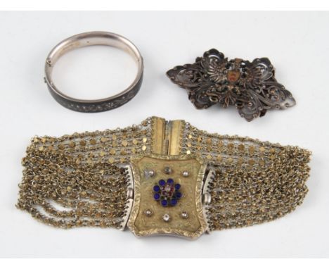 A lot to include an open metalwork buckle featuring eagle design, a gilt metal choker set with paste and a seed pearl and ena