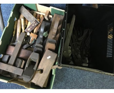 Two boxes of various wooden tools.