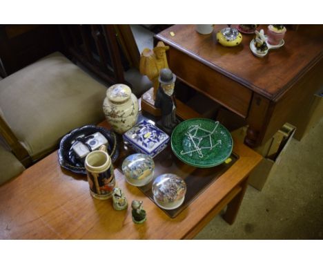 Two green glazed leaf plates; two Prattware pot lids and jars; a carved wooden ornament in the form of an elderly gentleman; 