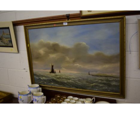 A gilt framed oil on board seascape, initialled J.D.