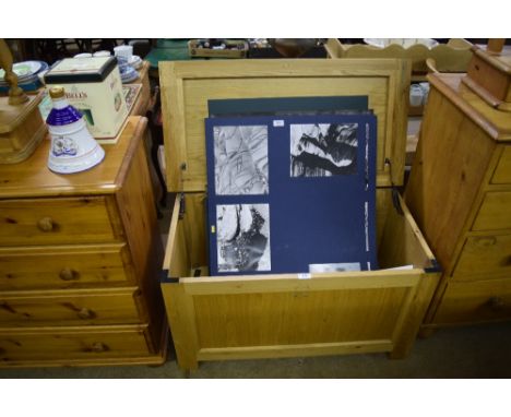 A light oak blanket box 