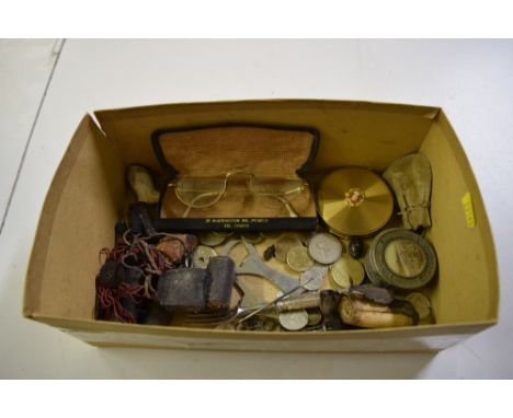 A box containing coins, a compact , spectacles etc. 