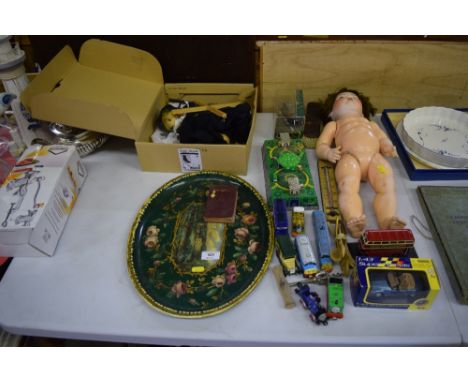 A dressed doll; together with a quantity of die-cast model vehicles; a rose decorated tray; a puppet etc. 