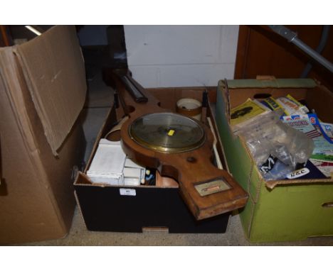 A box containing a barometer, binoculars and various sundries 