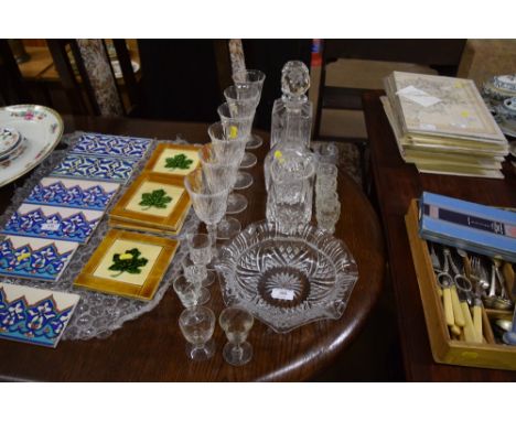 A Dartington glass decanter; together with one other decanter; and various drinking glasses 