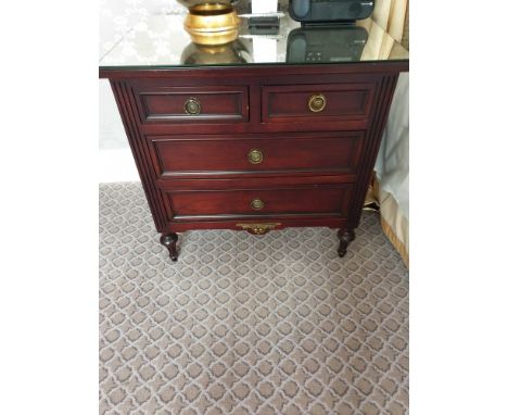 A Pair Four Drawer Mirrored Top Commode Chests Raised By Four Block Feet With A Square Carved Motif And Scrolled Movement Abo