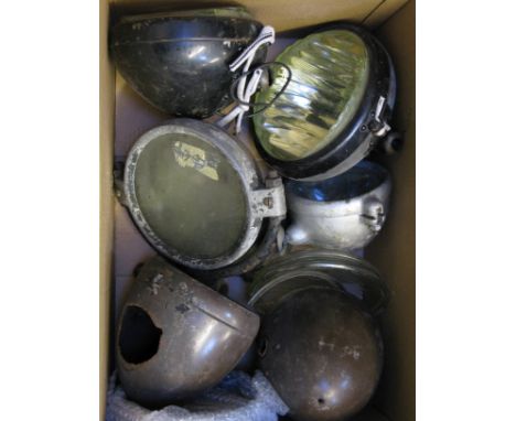 *Assorted Lighting.  A box of electric and acetylene-gas lighting for motor-cars and motorcycles, to include a rare stirrup m