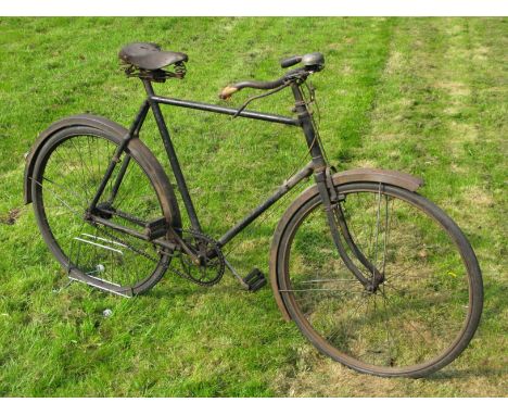 *A Gentleman's Roadster. Of unknown make, a stout machine with a 24-inch frame,  28-inch wheels, up-turned handlebars with ro
