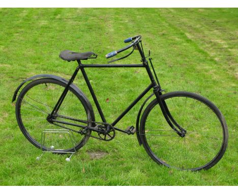 *A Gentleman's Bicycle. A late Victorian bicycle with a black-painted 23-inch frame,  23-inch handlebars with a brake lever o