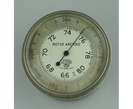*Motor Aneroid Barometer by S. Smiths & Son. Dating from the late veteran, early vintage period,  a working barometer, having