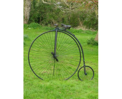 *A Singer & Co., 'Challenge' Ordinary. Dating circa 1885, and with a 54-inch driving wheel and 17-inch rear wheel,  this mach