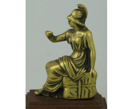 *Britannia. A brass mascot depicting a seated Britannia,  She was the personification of the Greek and Roman term for the geo