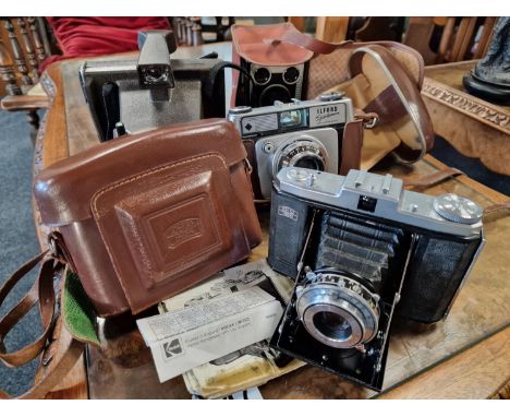 Quartet of Vintage Cameras inc a Zeiss Ikon Nettar, Polaroid, and Kodak