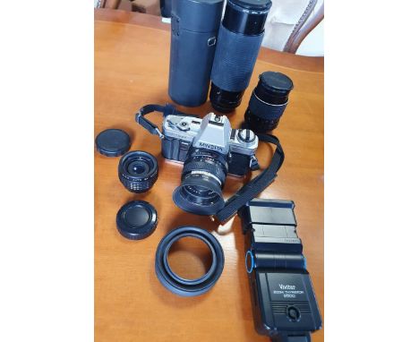 Minolta X-300 SLR camera, w. Hoya standard 52mm lens, Nikon 135mm lens, Hoya Skylight 52mm lens 2x auto-converter + Vivitar 2