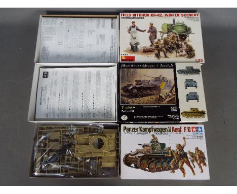 Three Boxed plastic military model kits scale 1:35. Lot includes Tamiya -  Panzer Kampfwagen tank and crew II ; Master box - 