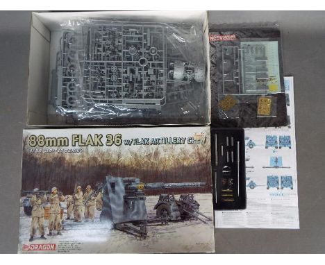 Dragon - a 1:35 scale Dragon '39 - '45 Series kit 88mm Flak 36 w/Flak Artillery Crew model No. 6260, model appears to have pa