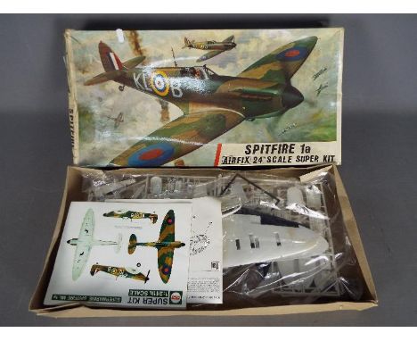 Airfix - A boxed vintage Airfix #1201 Spitfire 1a plastic model kit. The kit appears to be in Excellent condition with parts 