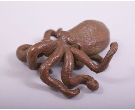 A JAPANESE BRONZE MODEL OF AN OCTOPUS, with large mark to underside, 7cm long.