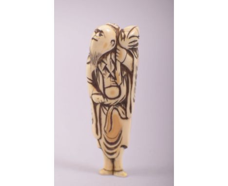 AN 18TH CENTURY CARVED IVORY SASHI NETSUKE of a sage, 10cm long.