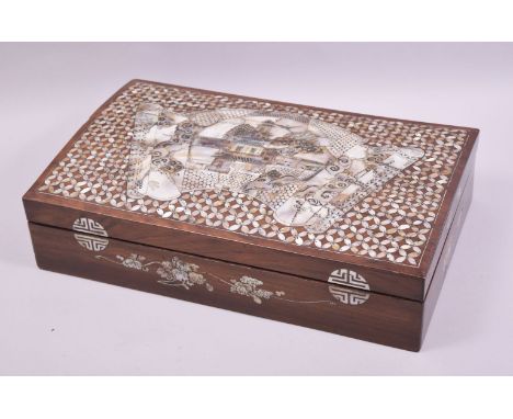 A VERY GOOD CHINESE ROSEWOOD AND MOTHER OF PEARL INLAID DOMED BOX, with buildings, scrolls and various motifs, 42cm wide.