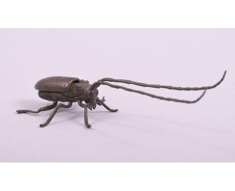 A JAPANESE BRONZE MODEL OF A BEETLE.