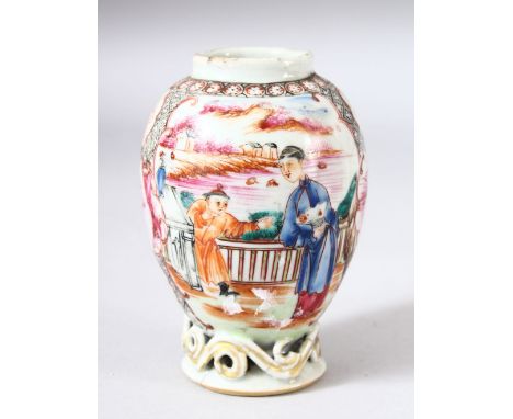 A SMALL CHINESE FAMILLE ROSE CADDY, painted with two panels of figures in different settings, 10.5cm high.