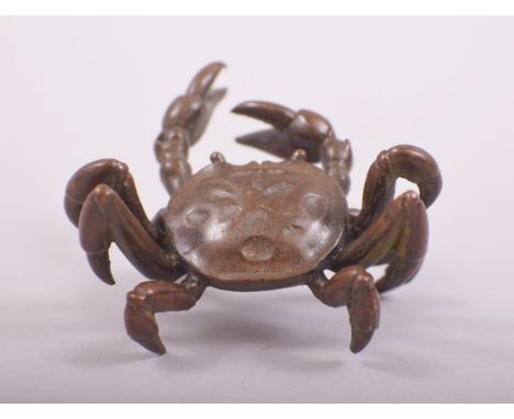 A SMALL JAPANESE BRONZE MODEL OF A CRAB, stamped underside, 6cm wide.