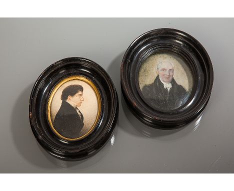 TWO VICTORIAN PORTRAIT MINIATURES
both of gentlemen dressed in black morning coats, in oval ebonised frames, the larger 12cm 