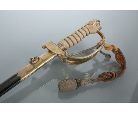 ROYAL NAVY OFFICER'S DRESS SWORD
makers Gieves, Matthews and Seagrove, with shagreen grip, the folding guard with fouled anch