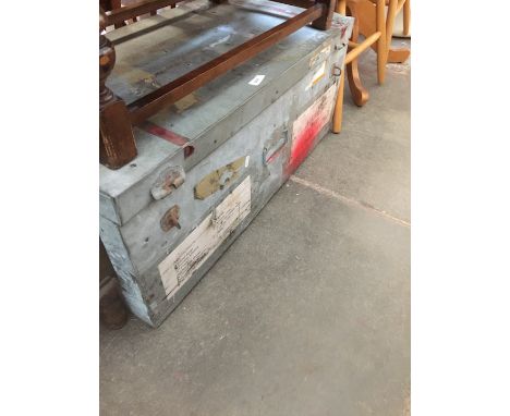 A large galvanised tin trunk 