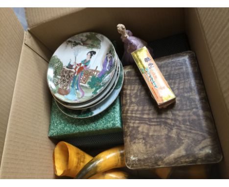 A box of misc cutlery sets, some Oriental plates, 3 animal horns, a harmonica in case, etc 