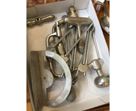 A box of surgical tools. 