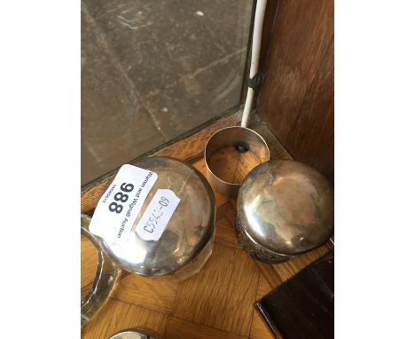 Two silver topped jars and a napkin ring 
