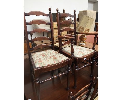 A set of 6 ladder back dining chairs 