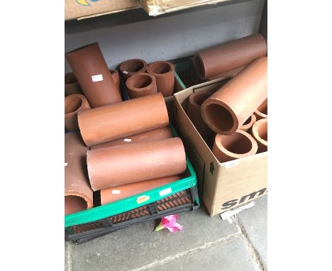 A large quantity of ceramic drains / wine coolers 