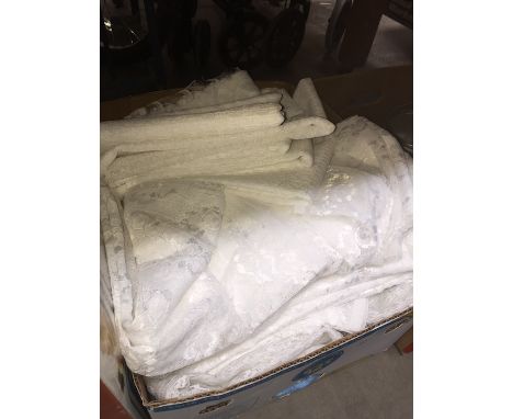 A box of mainly lace curtains 