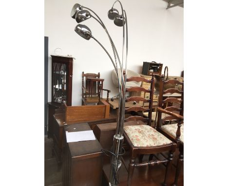 A modern chrome lamp with marble base 