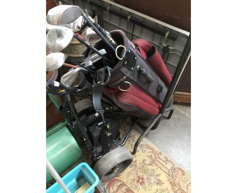 A golf caddy with battery and charger 
