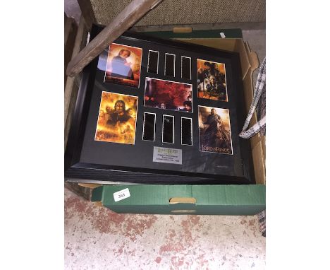 A box with framed and glazed "Lord of the rings" filmcell presentations 